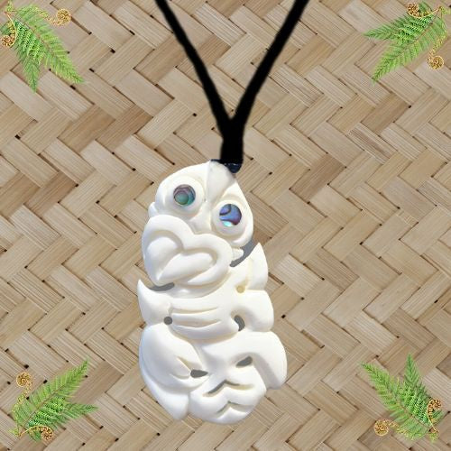 Bone Tiki with Paua Eyes Pendant - 52mm