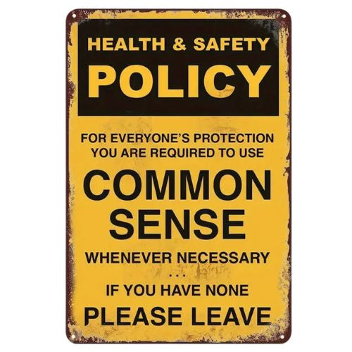 Common Sense Tin Sign