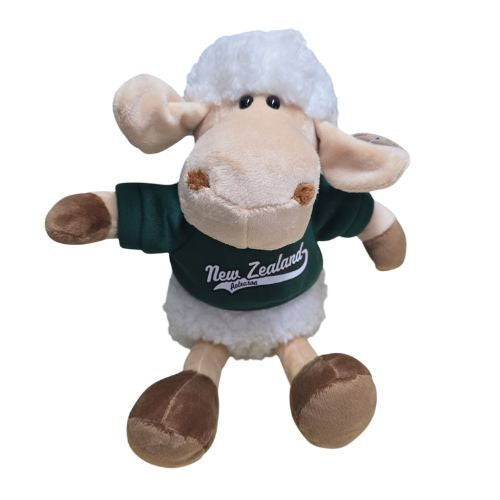 Sheep Sitting with Green Jumper