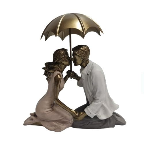 Couple with Umbrella Kneeling